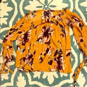 This is a lightly used off the shoulder blouse